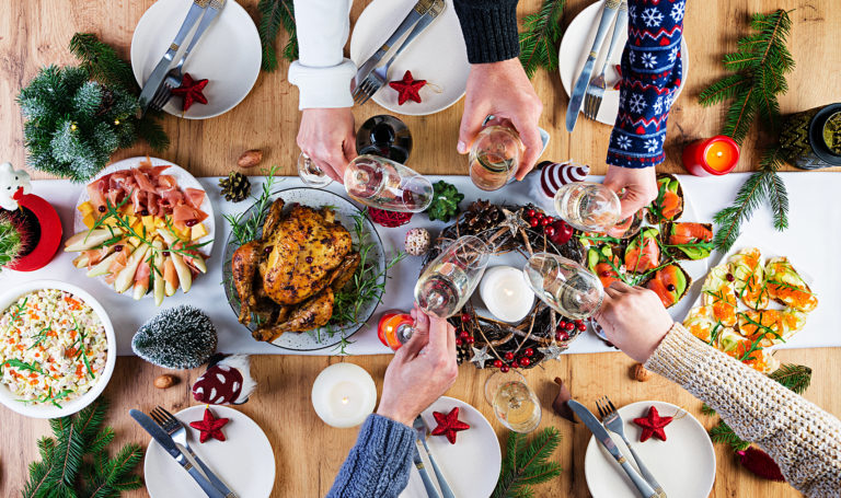 Baked pork belly with herbs. Boiled pork. Festive Christmas table. Top view, overhead